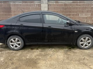 2012 Hyundai Solaris I, чёрный, 700000 рублей, вид 2
