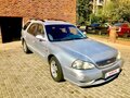 1999 Kia Clarus II, серый, 430000 рублей - вид 2