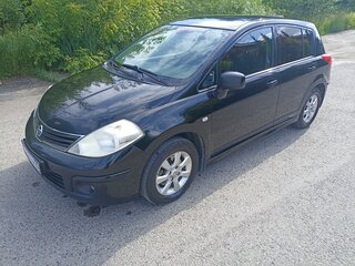 2011 Nissan Tiida I Рестайлинг, чёрный, 700000 рублей, вид 1