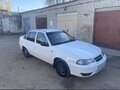 2009 Daewoo Nexia I Рестайлинг, белый, 215000 рублей - вид 8