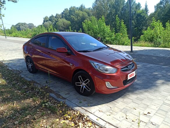2011 Hyundai Solaris I, красный - вид 5