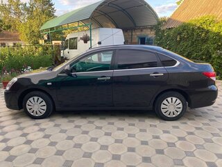 2013 Nissan Almera III (G15), чёрный, 750000 рублей, вид 2