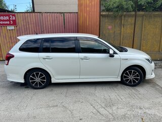 2013 Toyota Corolla Fielder XI (E160, E170, E180), белый, 1450000 рублей, вид 3