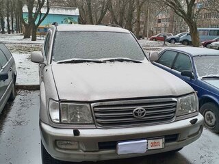 2004 Toyota Land Cruiser 100 Series Рестайлинг 1, серый, 1494803 рублей, вид 2