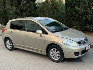 2011 Nissan Tiida I Рестайлинг, коричневый, 630000 рублей, вид 2