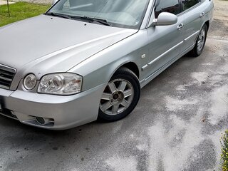 2005 Kia Magentis I Рестайлинг, серебристый, 240000 рублей, вид 2