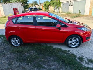 2016 Ford Fiesta Mk6 Рестайлинг, красный, 1150000 рублей, вид 2