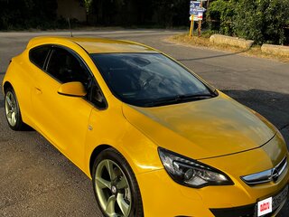 2011 Opel Astra GTC J Рестайлинг, жёлтый, 990000 рублей, вид 1