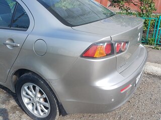 2012 Mitsubishi Lancer X Рестайлинг, серебристый, 950000 рублей, вид 5