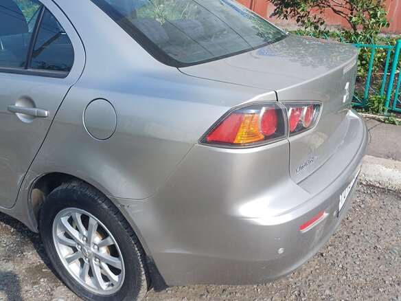 2012 Mitsubishi Lancer X Рестайлинг, серебристый, 950000 рублей - вид 4