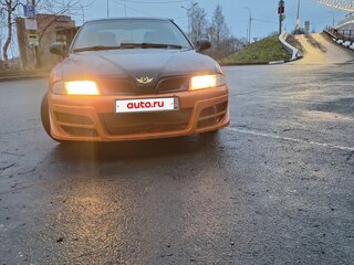 2003 Mitsubishi Carisma I Рестайлинг, оранжевый, 210000 рублей, вид 2