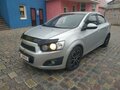 2013 Chevrolet Aveo II, серебристый - вид 1