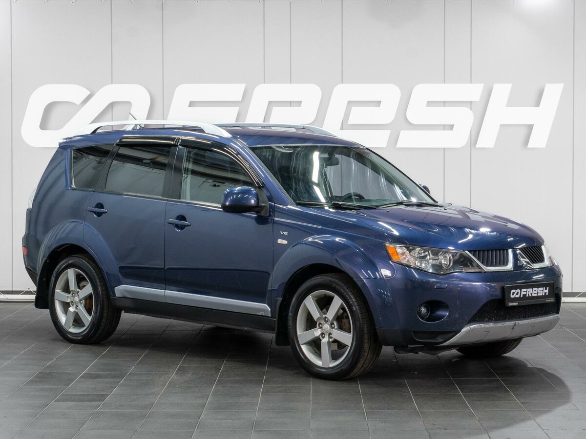 Открыть фотографии: Mitsubishi Outlander II