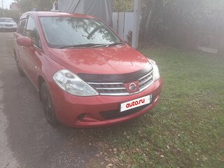 2009 Nissan Tiida I, красный, 675000 рублей, вид 2