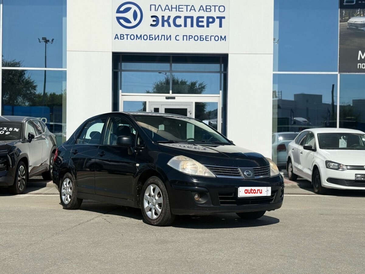 Открыть фотографии: Nissan Tiida I