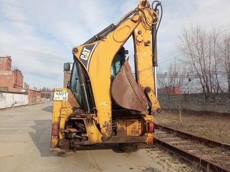 2006 Caterpillar 428, жёлтый, 3700000 рублей, вид 5