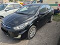 2014 Hyundai Solaris I, чёрный, 674000 рублей - вид 1