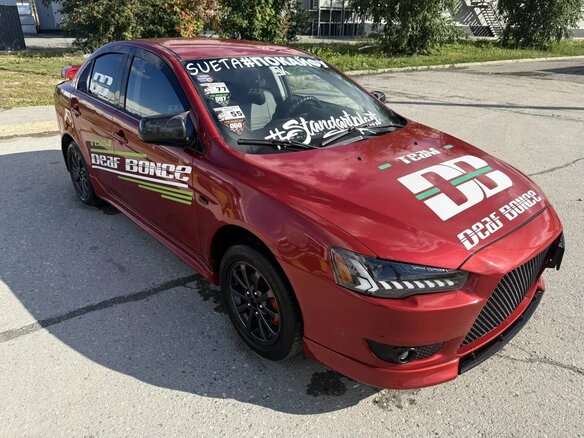 2010 Mitsubishi Lancer X, красный, 1399999 рублей - вид 12