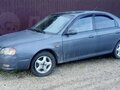 2001 Kia Spectra I Рестайлинг 1, серый, 250000 рублей - вид 1