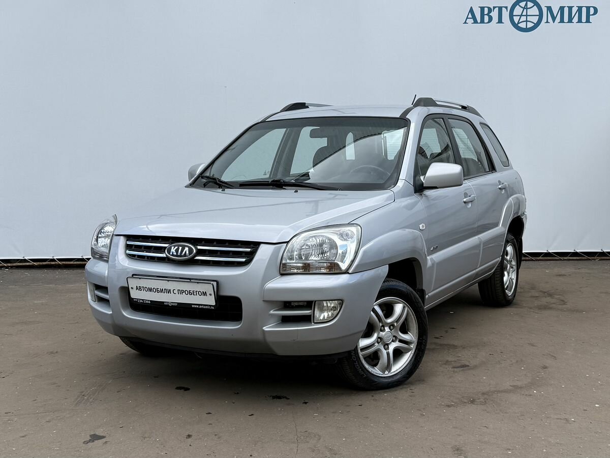 Открыть фотографии: Kia Sportage II