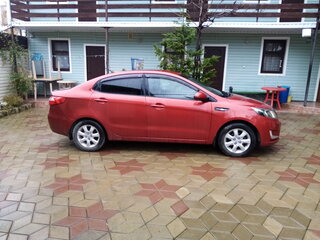 2014 Kia Rio 6-speed III, красный, 950000 рублей, вид 3