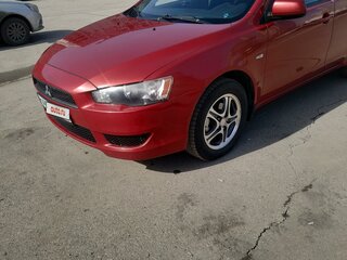 2007 Mitsubishi Lancer X, красный, 695000 рублей, вид 1