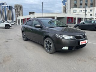 2011 Kia Cerato 6-speed II, золотистый, 850000 рублей, вид 1