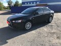 2014 Mitsubishi Lancer X Рестайлинг, чёрный, 980000 рублей - вид 1