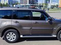 2011 Mitsubishi Pajero IV Рестайлинг 1, коричневый, 1950000 рублей - вид 1