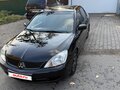 2007 Mitsubishi Lancer IX Рестайлинг, чёрный, 520000 рублей - вид 2
