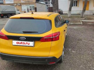 2015 Ford Focus III Рестайлинг, жёлтый, 650000 рублей, вид 3