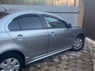 2010 Mitsubishi Lancer X, серебристый, 660000 рублей, вид 1