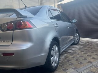 2010 Mitsubishi Lancer X, серебристый, 660000 рублей, вид 3