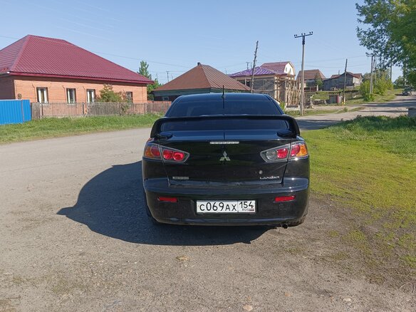 2012 Mitsubishi Lancer X Рестайлинг, чёрный, 1000000 рублей - вид 4