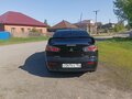 2012 Mitsubishi Lancer X Рестайлинг, чёрный, 1000000 рублей - вид 4