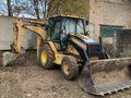 2002 Caterpillar 428, 2800000 рублей