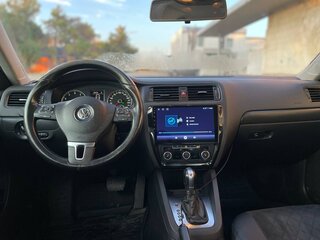 2014 Volkswagen Jetta VI Рестайлинг, серебристый, 1350000 рублей, вид 5