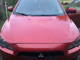 2007 Mitsubishi Lancer X, красный, 475000 рублей, вид 1