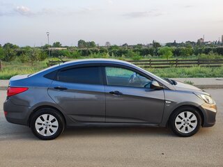 2011 Hyundai Solaris I, серый, 730000 рублей, вид 4