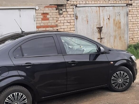 2012 Chevrolet Aveo II, чёрный, 700000 рублей - вид 5