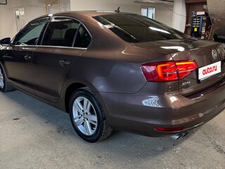 2015 Volkswagen Jetta VI Рестайлинг, коричневый, 1030000 рублей, вид 4