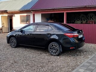 2014 Toyota Corolla XI (E160, E170, E180), чёрный, 1450000 рублей, вид 4