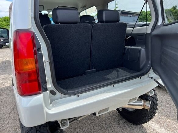 2013 Suzuki Jimny Kei car III Рестайлинг 2, белый - вид 4