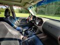 2001 Mitsubishi Montero III, серый, 680000 рублей - вид 9