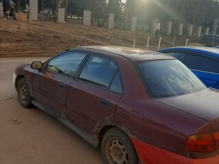 1998 Mitsubishi Carisma I, фиолетовый, 135000 рублей, вид 4