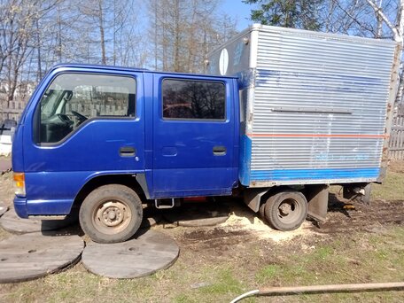 1990 Isuzu Elf (N-series), синий, 500000 рублей, вид 2