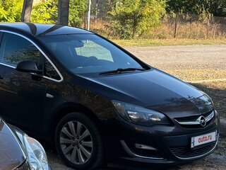 2014 Opel Astra J Рестайлинг, коричневый, 1290000 рублей, вид 1