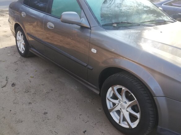 2006 Chevrolet Evanda, серый - вид 2