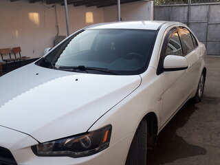 2010 Mitsubishi Lancer X, белый, 800000 рублей, вид 1