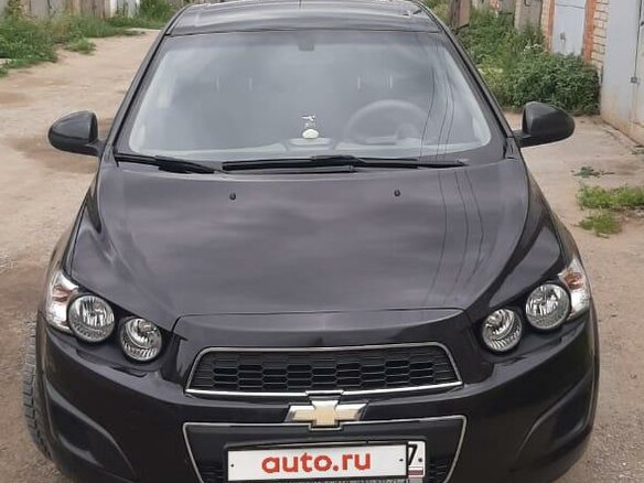 2012 Chevrolet Aveo II, чёрный, 700000 рублей - вид 1